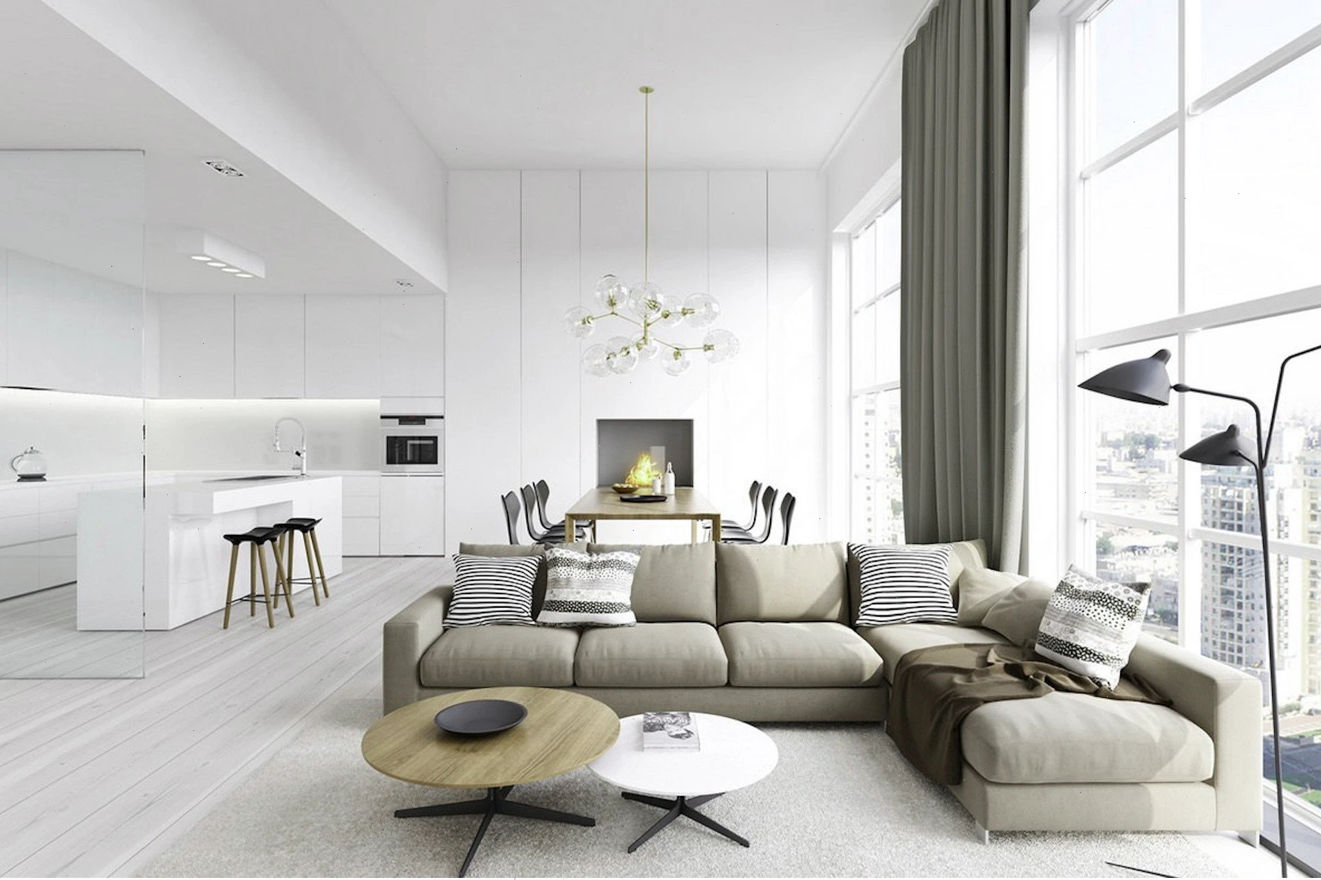 Soggiorno moderno con cucina bianca, divano grigio e vista sulla città